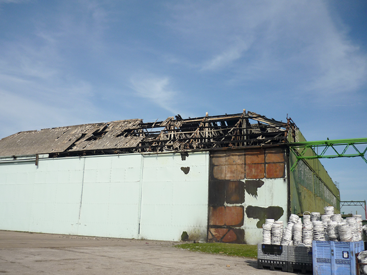Fire-damaged-Asbestos-Roof